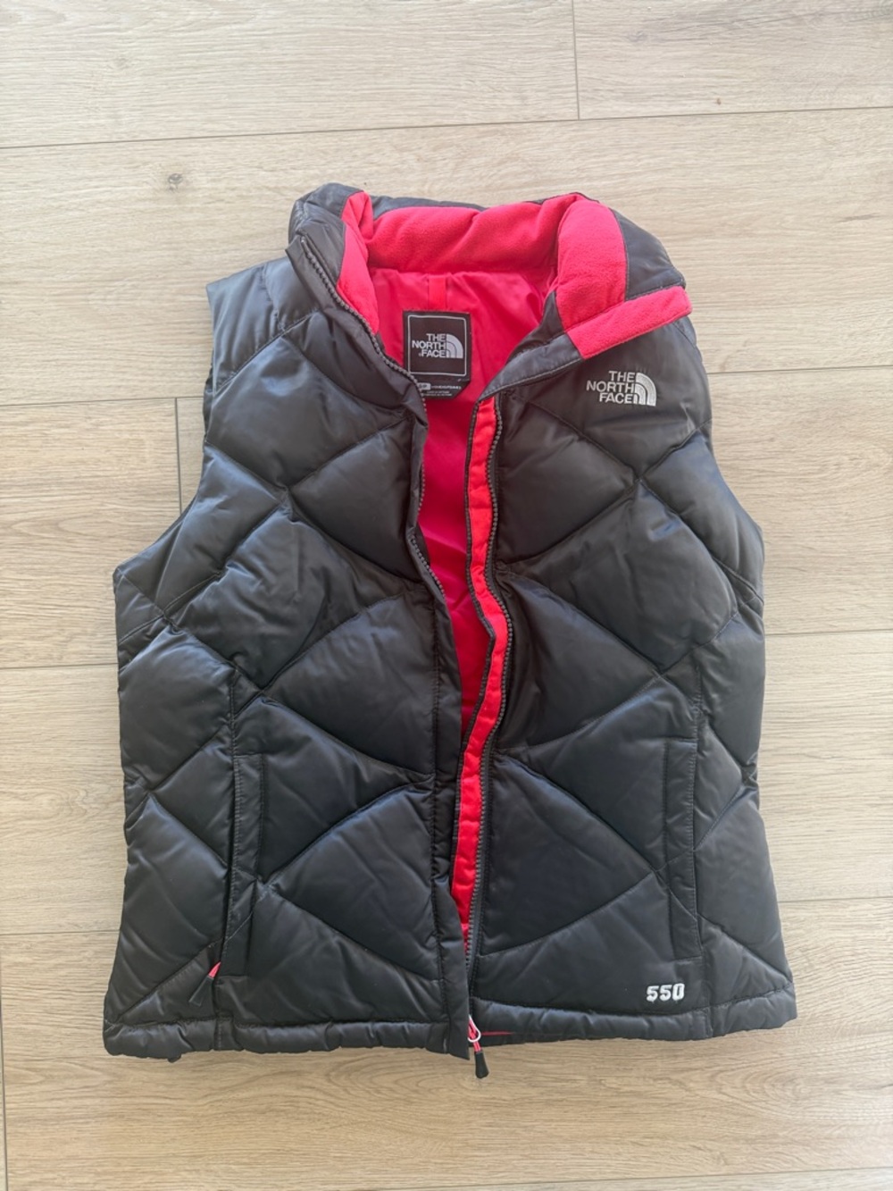 The North Face Black with Red Lining Quilted 550 Insulated Vest